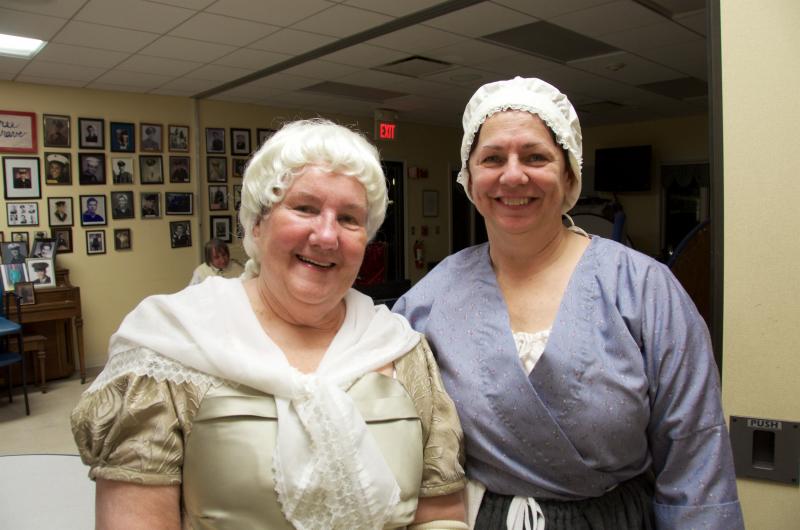 Claire Smith of the Wareham Minutemen and Militia presided over the dinner while Michele Bissonnette prepared the elaborate meal. BY GEORGIA SPARLING